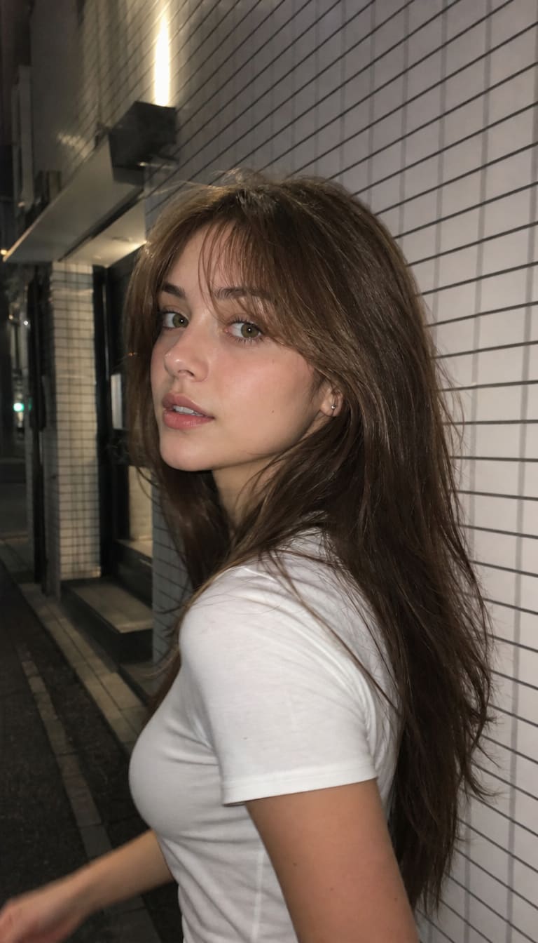 Ultra-realistic candid smartphone photograph,  vertical.

Scene
Nighttime on a quiet Tokyo city sidewalk — AI-generated image